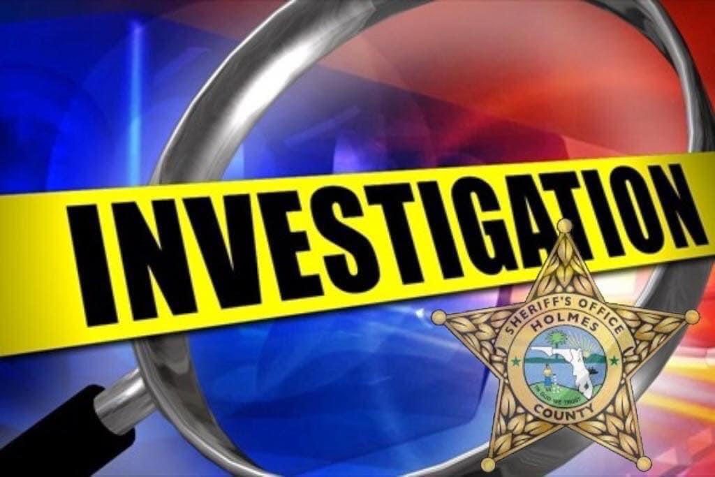 A police investigator 's logo is shown under a magnifying glass.