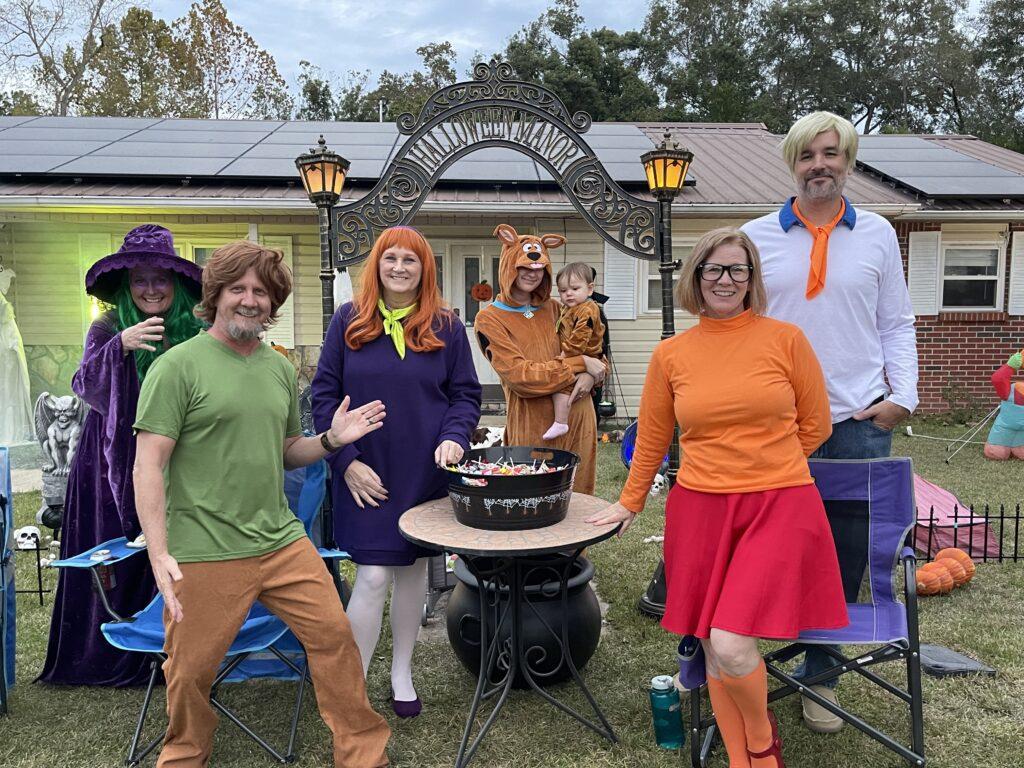 A group of people dressed up in costumes.