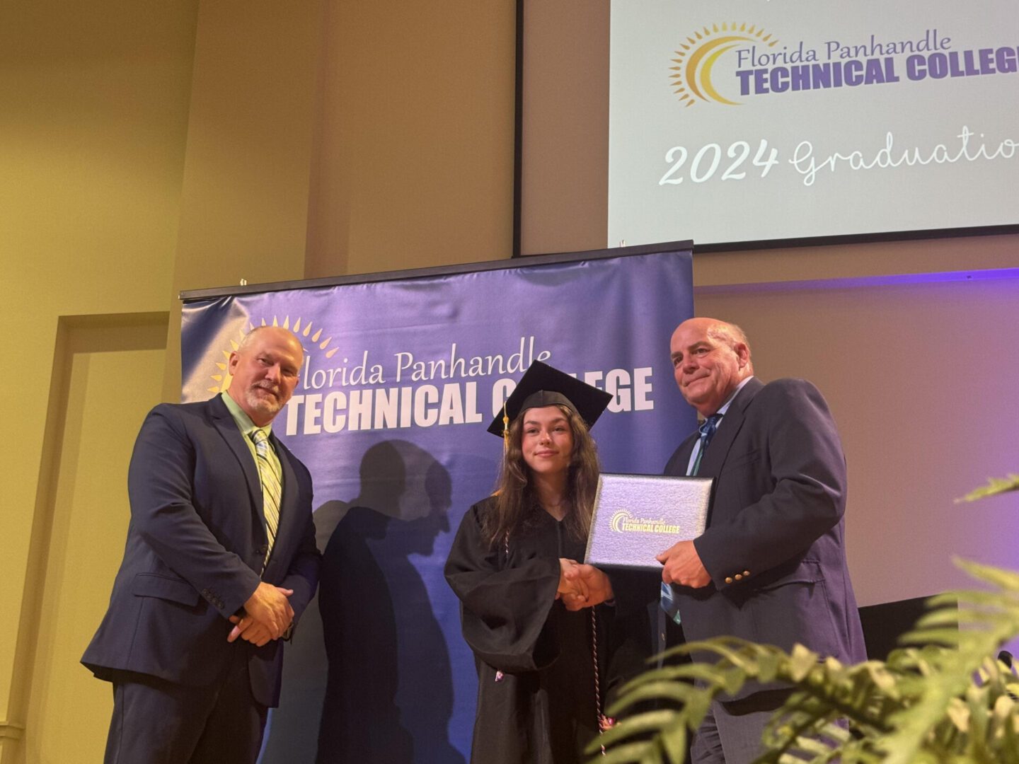 Florida Panhandle Technical College graduate receiving diploma