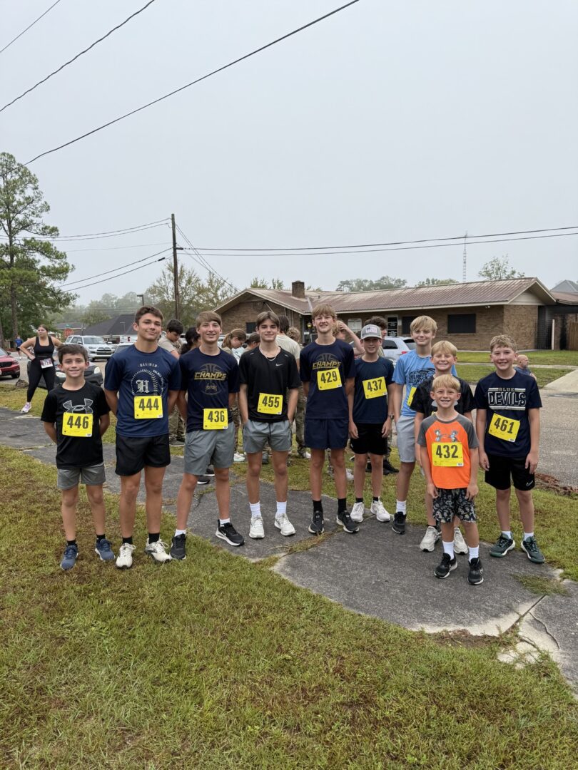 Group of boys in race bibs outdoors Group of boys in race bibs outdoors