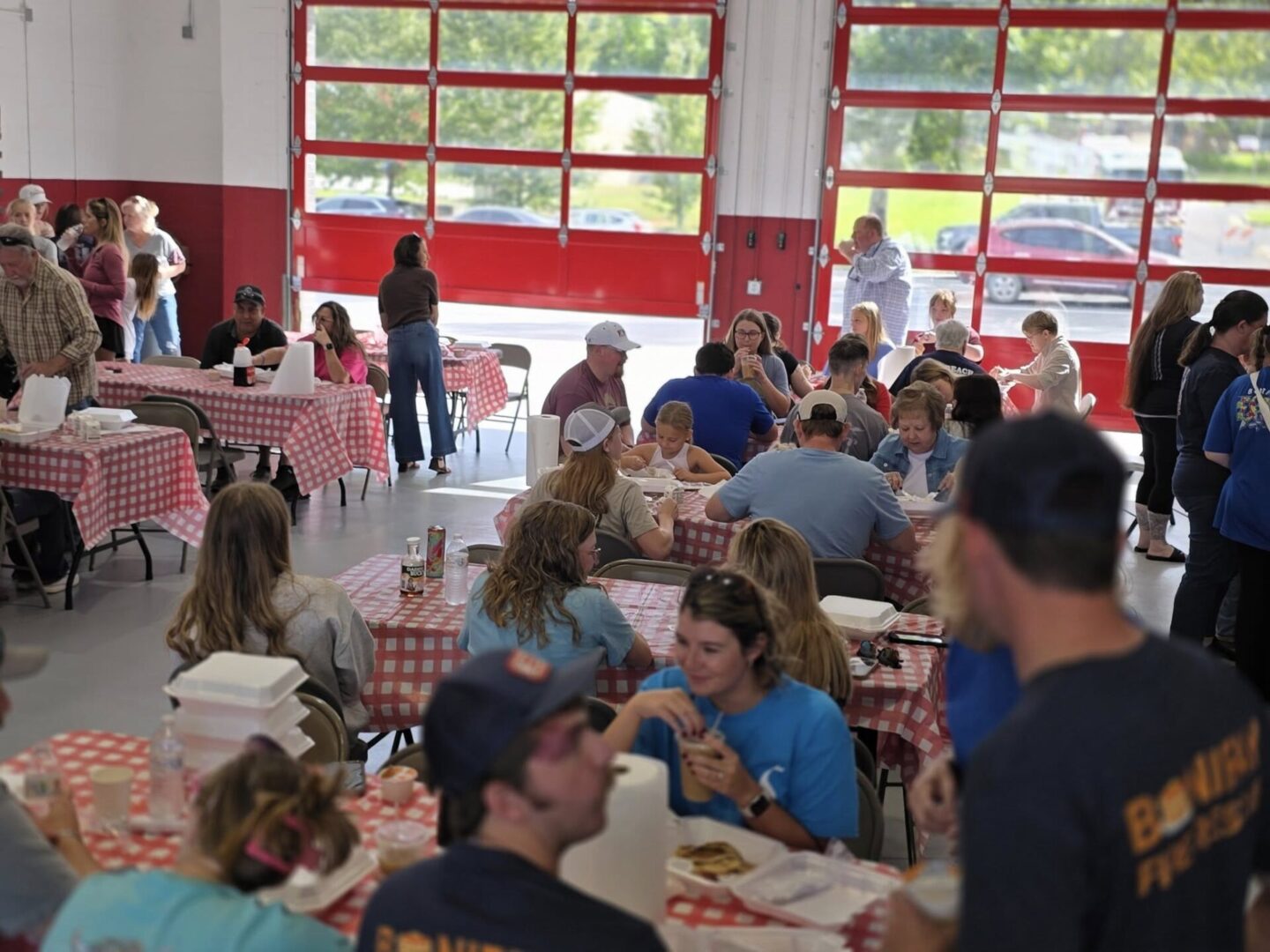 Community meal in fire station garage