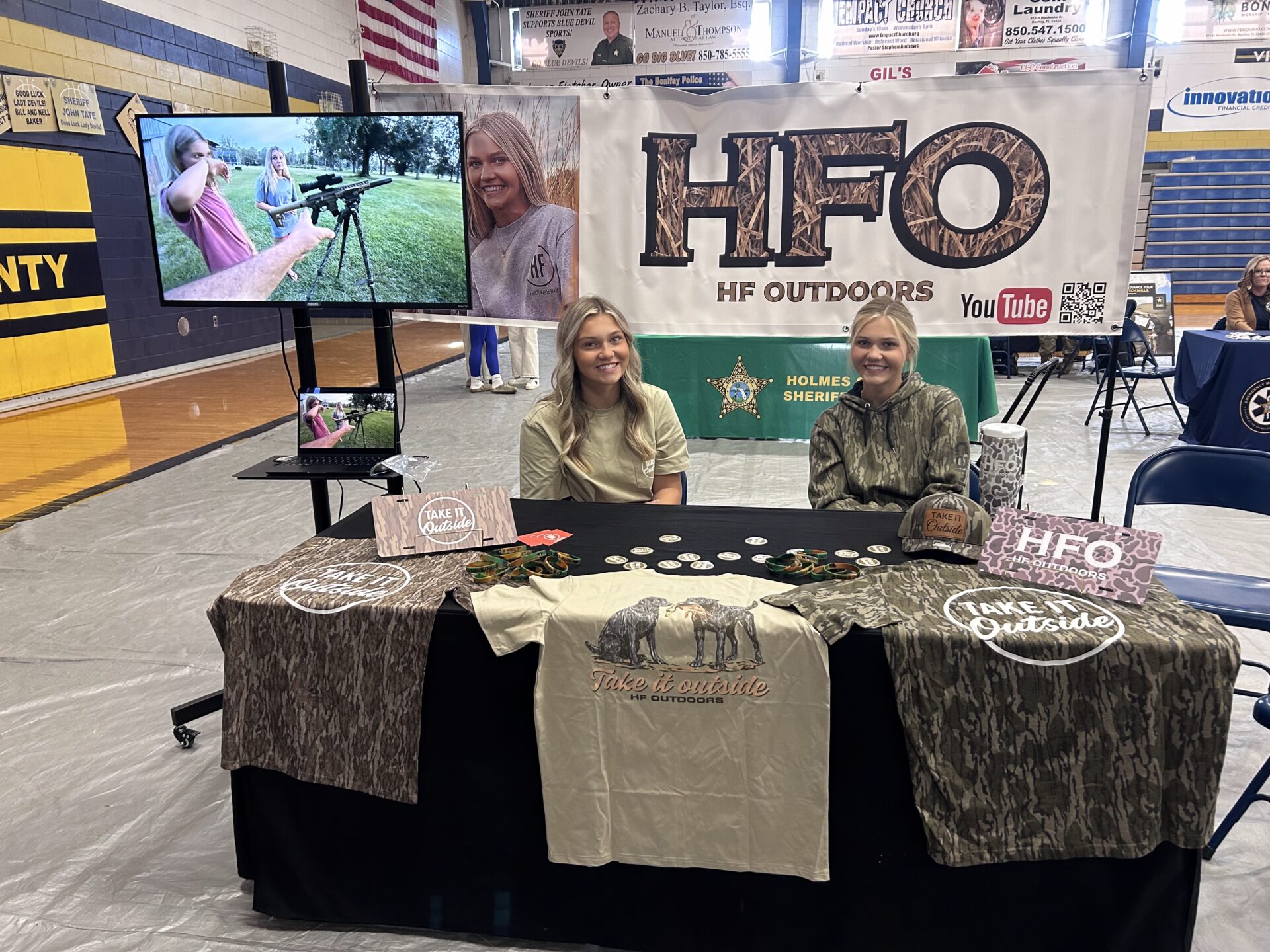 Two women at HF Outdoors booth